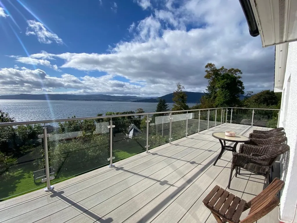 With the extension and modernisation of this balcony, our stainless steel EazyPost 0.74kN balustrade and Dovetail Grey Home Deck boards were the perfect upgrade. The post and handrail system securely replaced the aged timber balustrade, offering a longer lasting and lower maintenance system for years to come.

The wooden decking was also replaced with our composite Home Deck boards, as years of weathering and exposure to the elements had taken its toll on the look and performance. The composite boards will require no periodic staining/coating, wont warp over time or splinter and split, giving the home owner more a low maintenance alternative for years to come.

