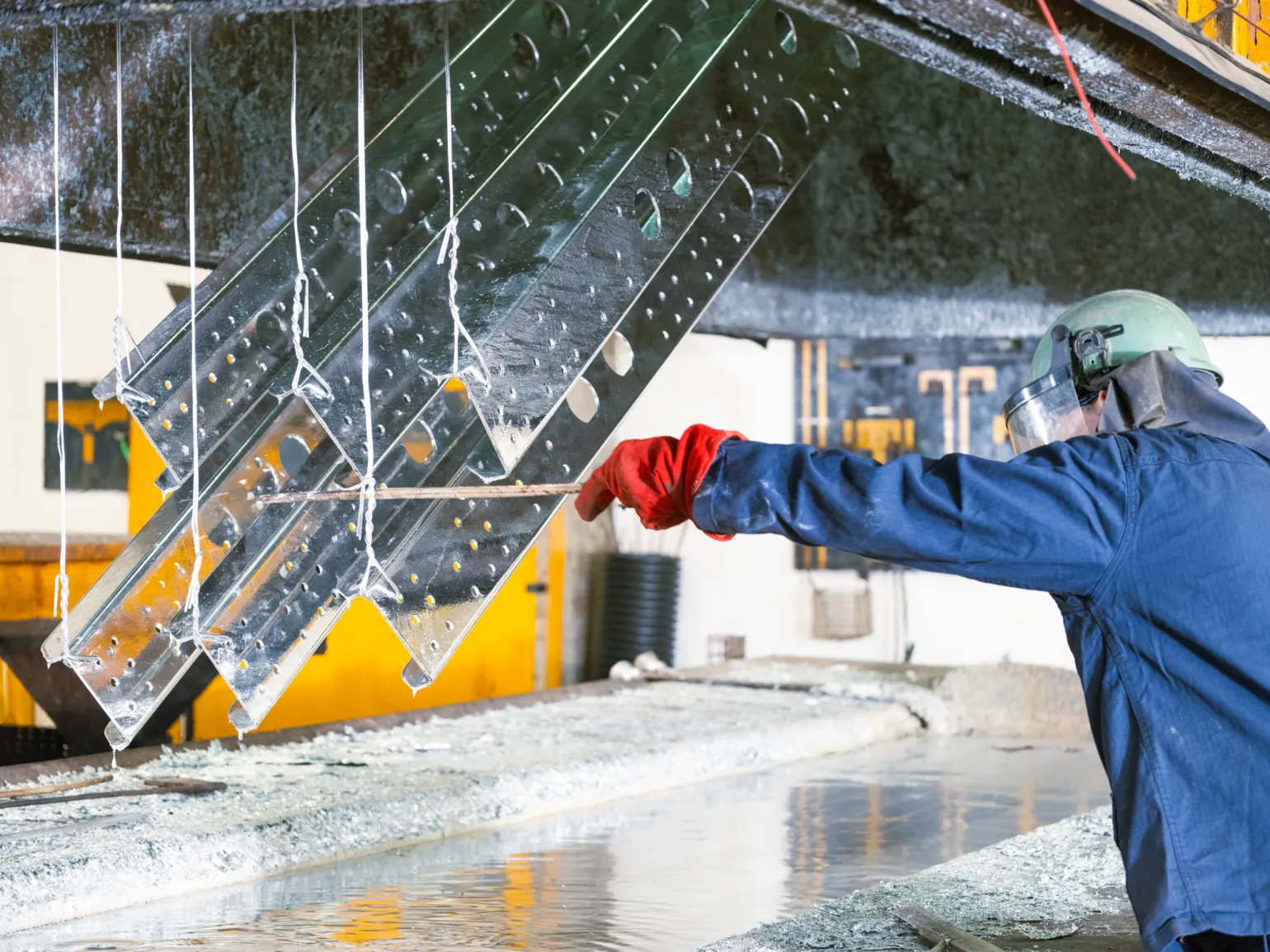 At BM Steel, we provide galvanising solutions that utilise the proven hot dip galvanising process, in which steel is immersed in molten zinc at approximately 450°C to create a tough, metallurgically bonded coating that offers outstanding corrosion resistance and long-term durability. This process ensures complete protection — including edges, corners and internal surfaces — delivering maintenance-free performance that can exceed 70 years, depending on environmental conditions.
As one of the most sustainable and cost-effective steel protection methods available, hot dip galvanising minimises waste by reusing excess zinc and consistently provides the lowest lifetime cost compared with alternative coatings.