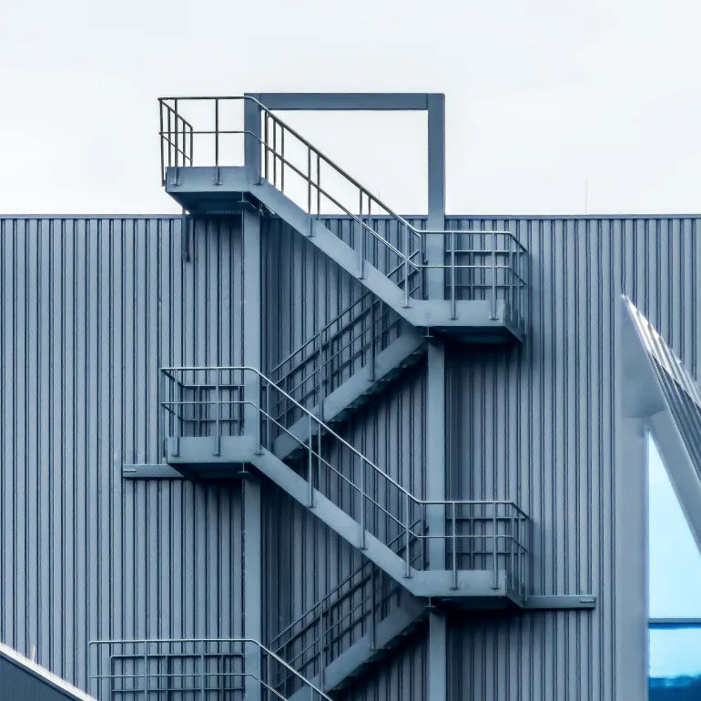 4. Fencing, Handrails, and Safety Barriers
One of the most visible everyday applications — our handrail tubes, palisade fencing, and galvanised fence posts are all mild steel underneath, protected with a zinc coating for the outdoors.