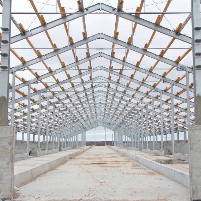 6. Agricultural and Industrial Structures
From sheds to outbuildings, these lean heavily on the same structural sections and sheet products above, usually specified in a galvanised or primer-painted finish for a maintenance-free lifespan outdoors.